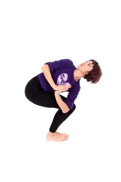 Mulher realizando exercícios de ioga — Fotografia de Stock