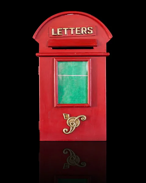 Retro roter Briefkasten, isoliert auf schwarz — Stockfoto