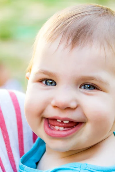 Adorable, laughing baby looking at camera — Stock Photo, Image