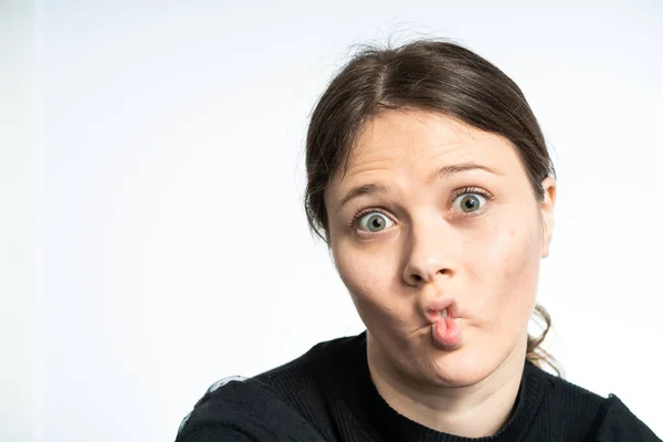 Happy Young Woman Making Funny Faces Wearing Black White Background — 图库照片