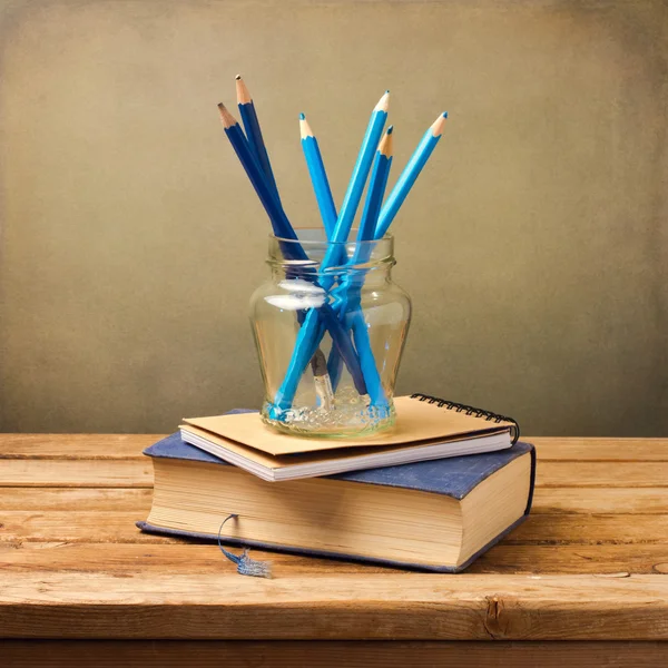 Old vintage book, note book and blue pencils — Stock Photo, Image