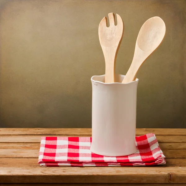 Kitchen utensils with tablecloth — Stock Photo, Image