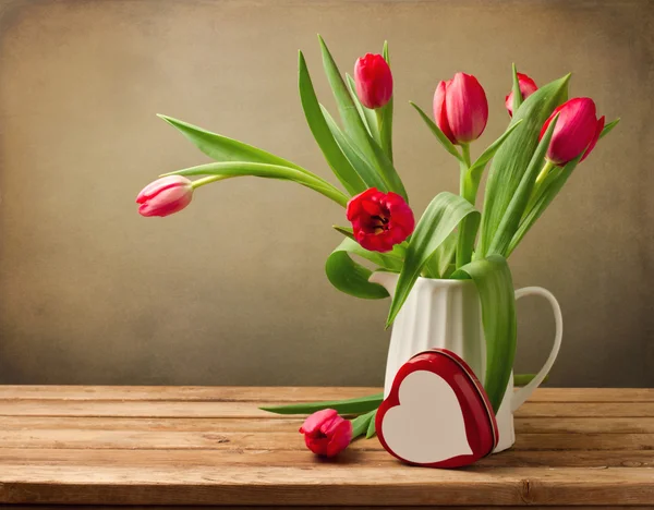 Beautiful tulip bouquet with heart shape box — Stock Photo, Image