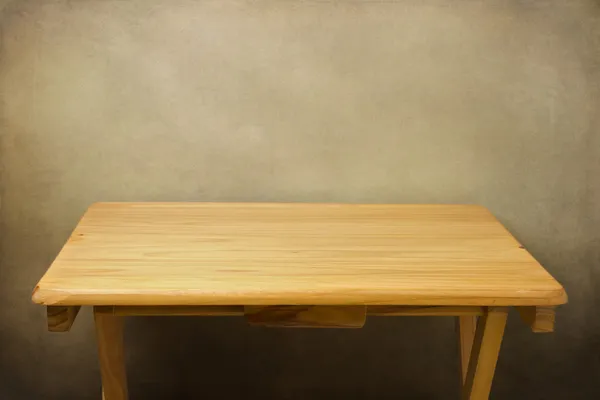 Table en bois sur fond grunge — Photo