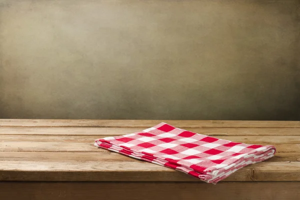 Background with tablecloth and wooden deck table — Stock Photo, Image