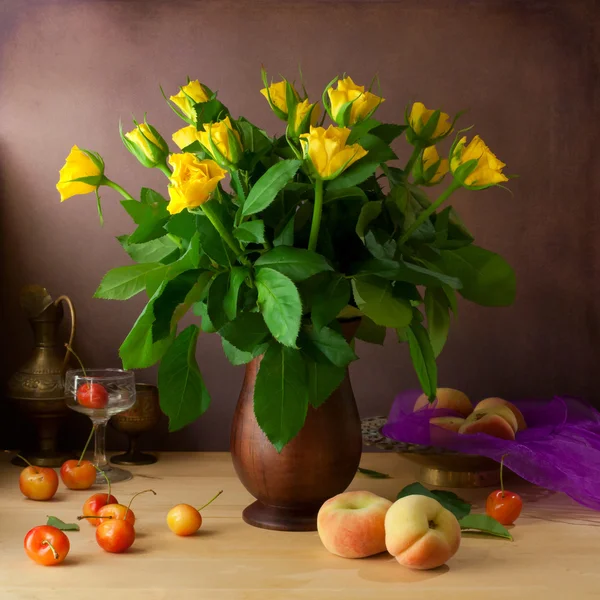 Classical still life with yellow roses and fruits — Stock Photo, Image