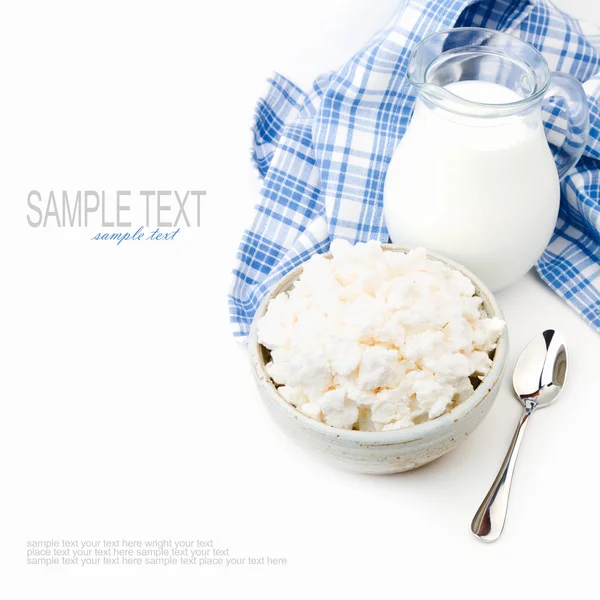 Cottage cheese and milk on white background — Stock Photo, Image