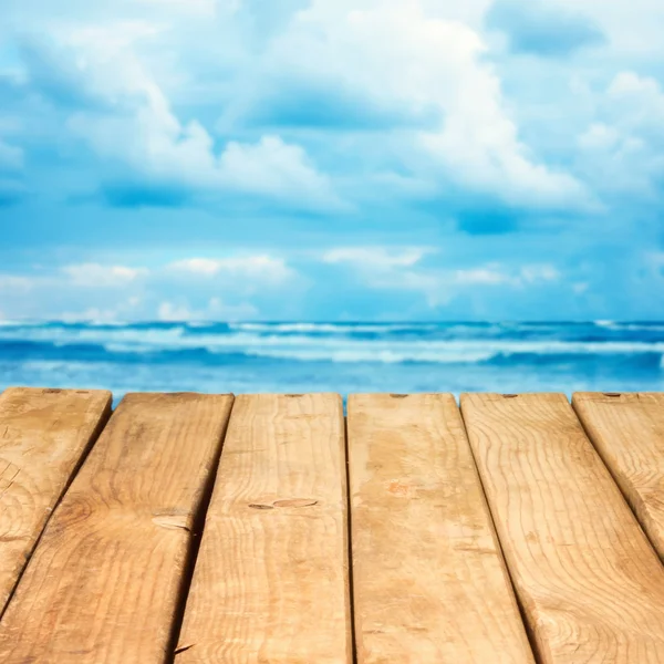 Empty wooden deck over sea and sky background — Stock Photo, Image