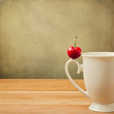Tek kiraz Kupası tutamacı