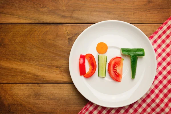 Plate with vegetables and word diet — Stock Photo, Image