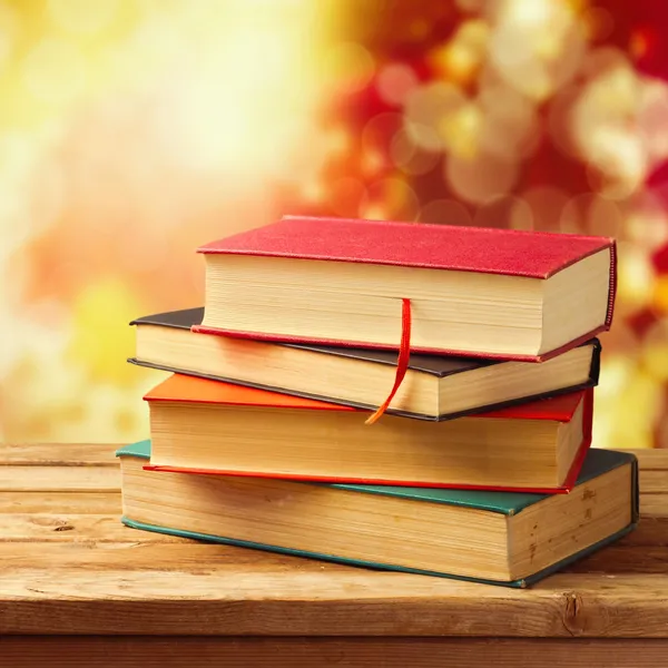 Old vintage books on wooden table — Stock Photo, Image