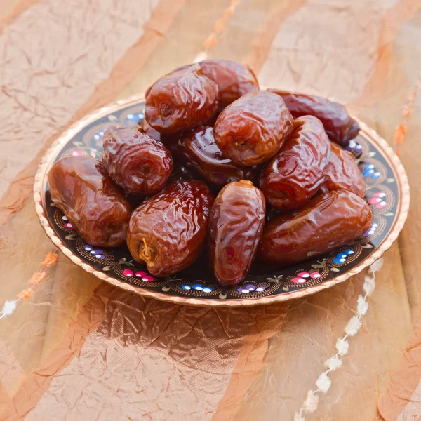 Dates on plate — Stock Photo, Image