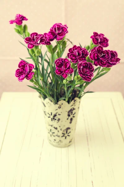 Pink carnation flower in vintage metal bucket — Stock Photo, Image