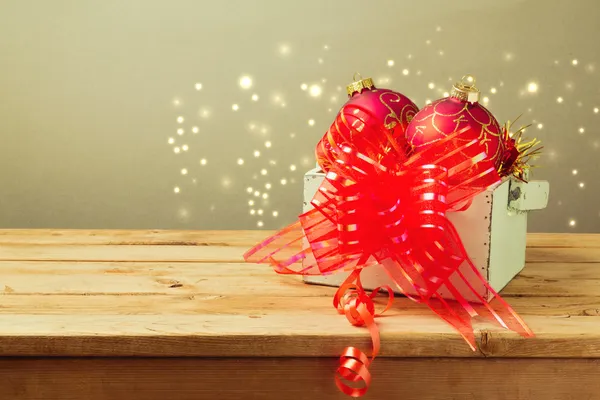 Wooden box with Christmas ornamnents — Stock Photo, Image