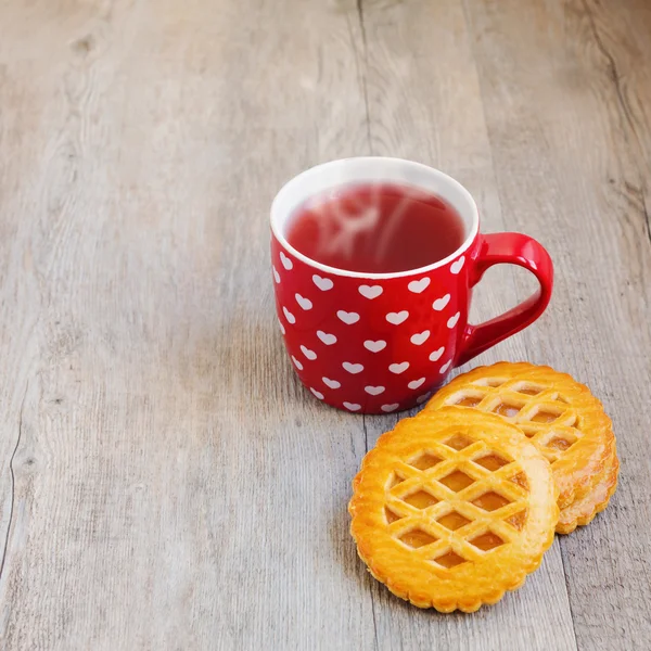 Чашка чая и печенье — стоковое фото