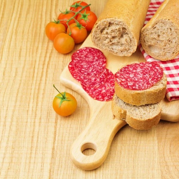 Sandwich with sliced meat sausage — Stock Photo, Image