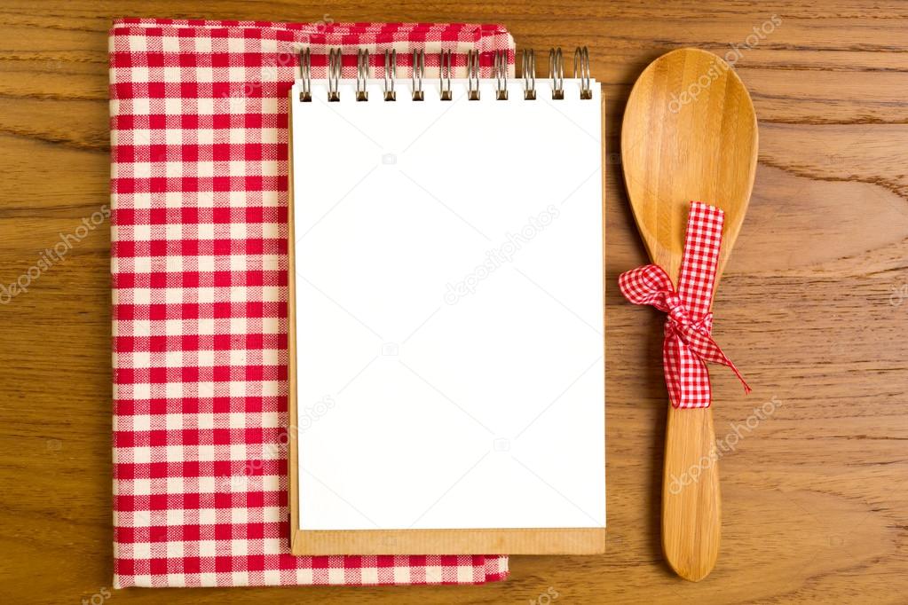 Blank note book with wooden spoon