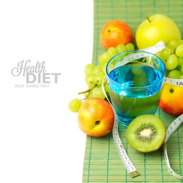 Fruits and glass of water — Stock Photo, Image