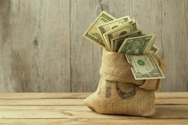 Money in sack — Stock Photo, Image