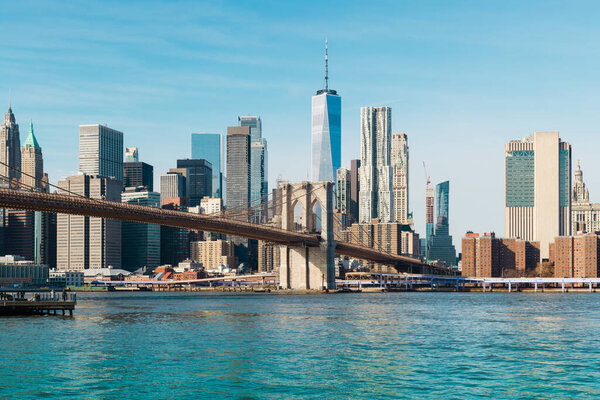 New York city Lower Manhattan skyline and Brooklyn bridge panorama
