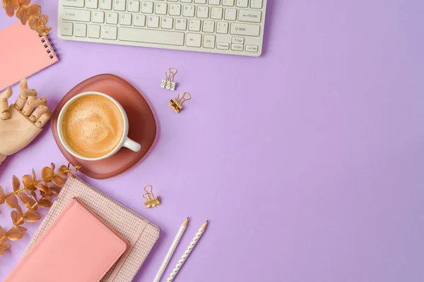 Stylish Feminine Table Coffee Cup Notebook Computer Keyboard Purple Background — Stock Photo, Image