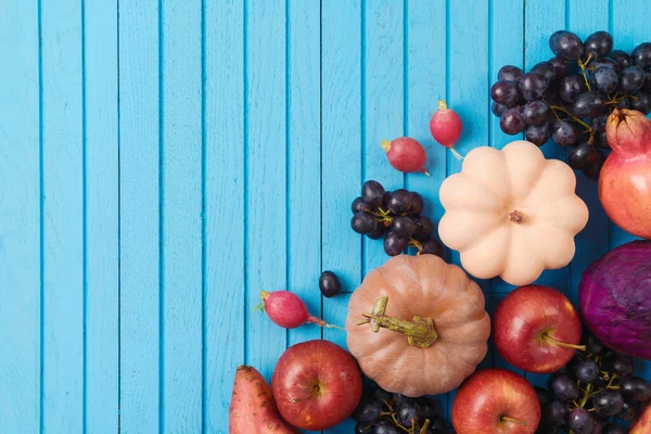 Autumn Harvest Concept Pumpkin Apple Grapes Blue Wooden Background Top — Stockfoto