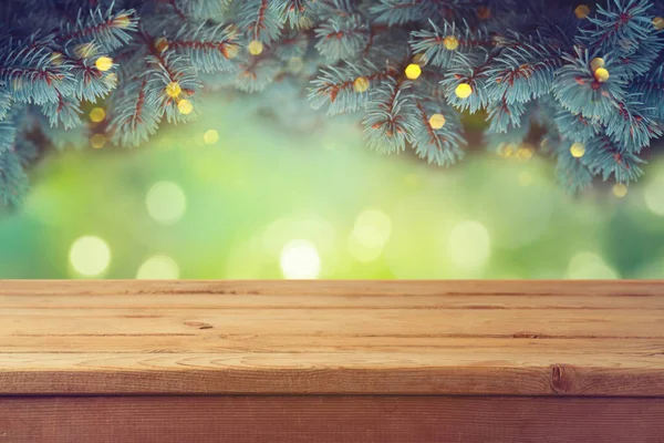 Lege Houten Tafel Boven Mooie Groene Dennenboomtakken Achtergrond Kerstvakantie Mock — Stockfoto