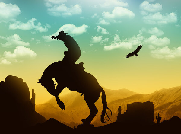 Silhouette cowboy with horse