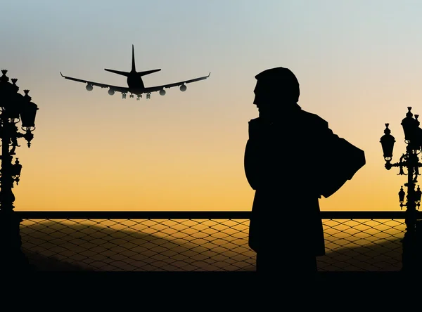 Silhouette di un uomo sullo sfondo di un aereo — Foto Stock