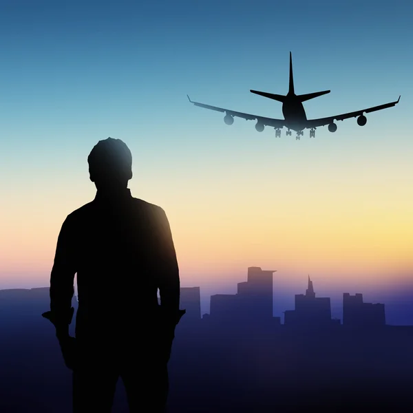 Silhouette di un uomo sullo sfondo di un aereo — Foto Stock