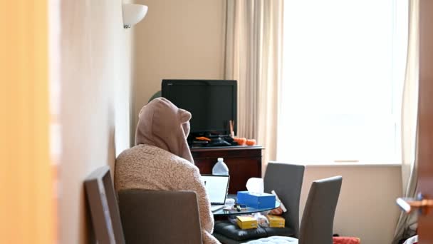 Slider Shot Obscuring Female Hooded Dressing Gown Working Laptop Table — Stock Video
