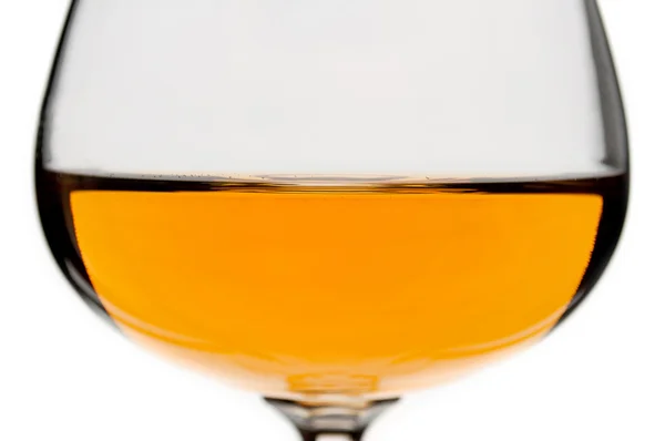 One brandy glass on the white background — Stock Photo, Image