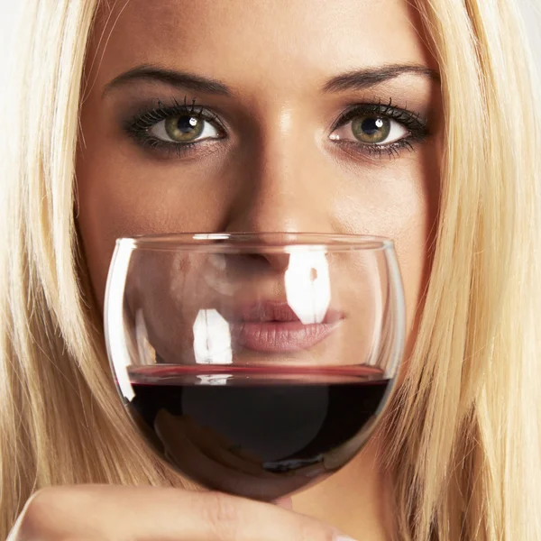 Face of beauty blond woman with red wine — Stock Photo, Image