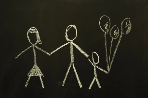 Family. child drawing on blackboard. concept background