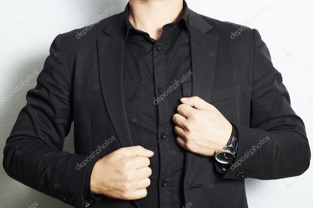 Man in a business suit and black shirt.fashion