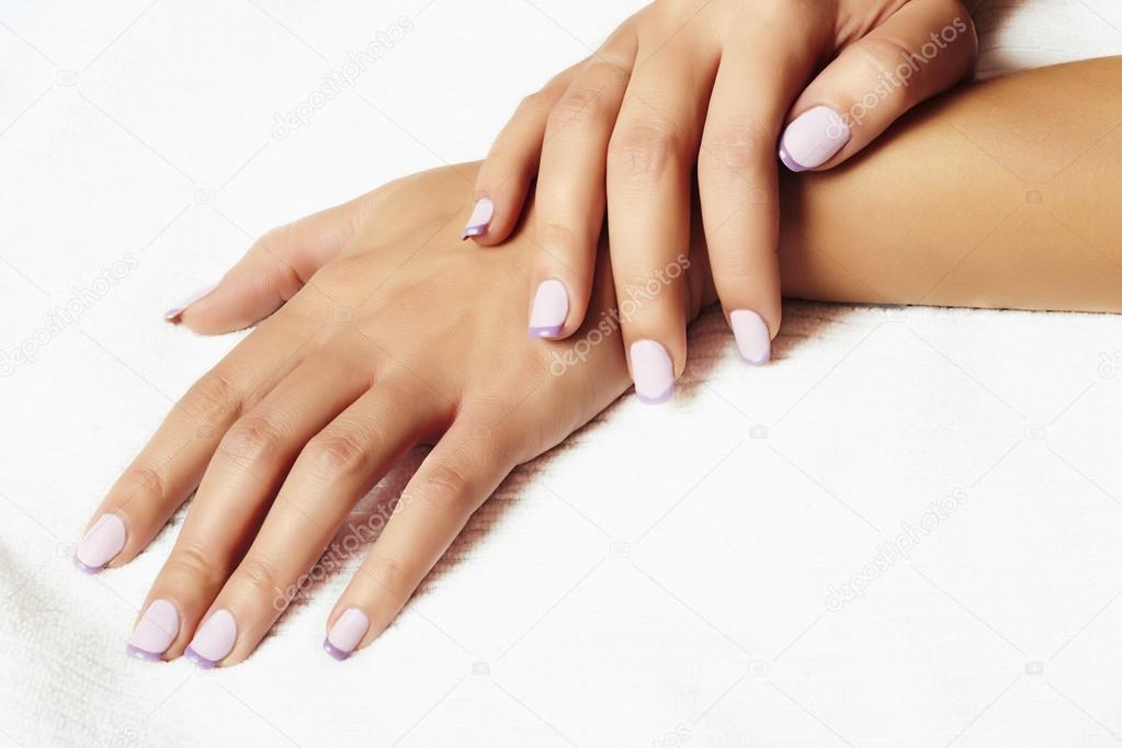 Manicure.female hands.beauty salon.shellac polish