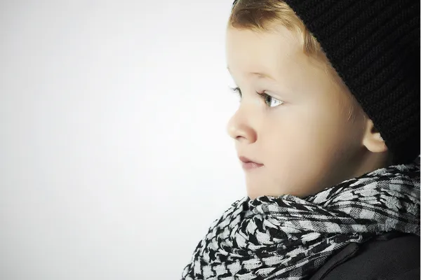 Fashionable little boy in scarf and cap.winter style children — Stock Photo, Image