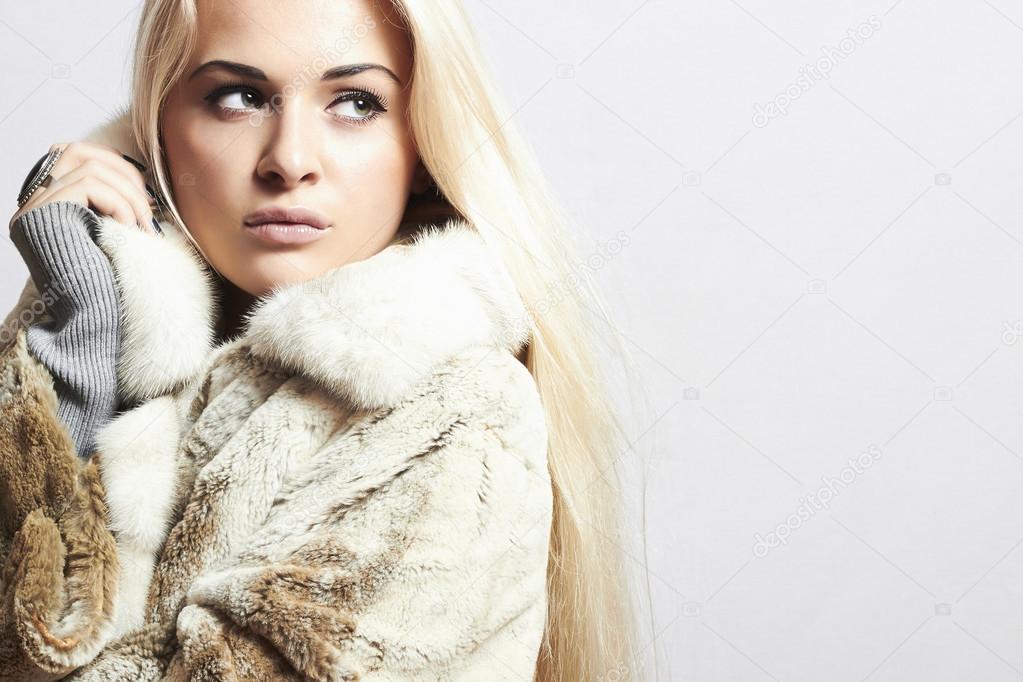 Beauty blond Model Girl in Mink Fur Coat.Beautiful Woman