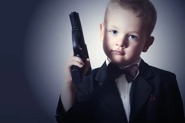 Boy with gun