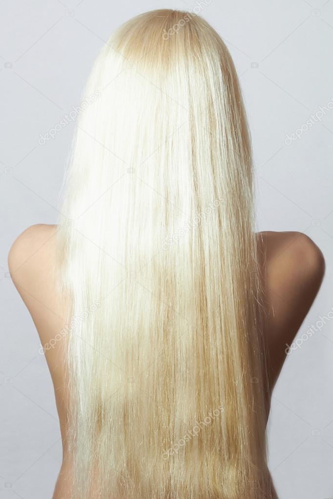 Blond Hair of Naked Girl. Back side of Young Woman with Straight Hair