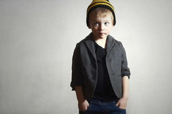 Funny little Boy.grunge cap and jeans.stylish kid in blazer. Fashion Children. — Zdjęcie stockowe