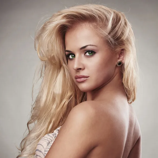 Sensitive Beautiful blond woman.hairstyle.salon care.sexy girl. green eyes — Stock Photo, Image