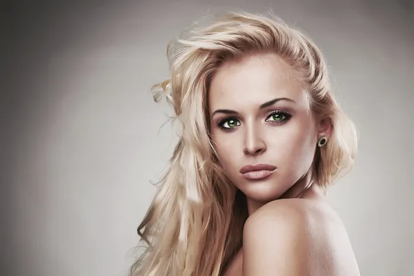 Young beautiful woman.Sexy Blond girl. Gray Background.Your text here — Stock Photo, Image