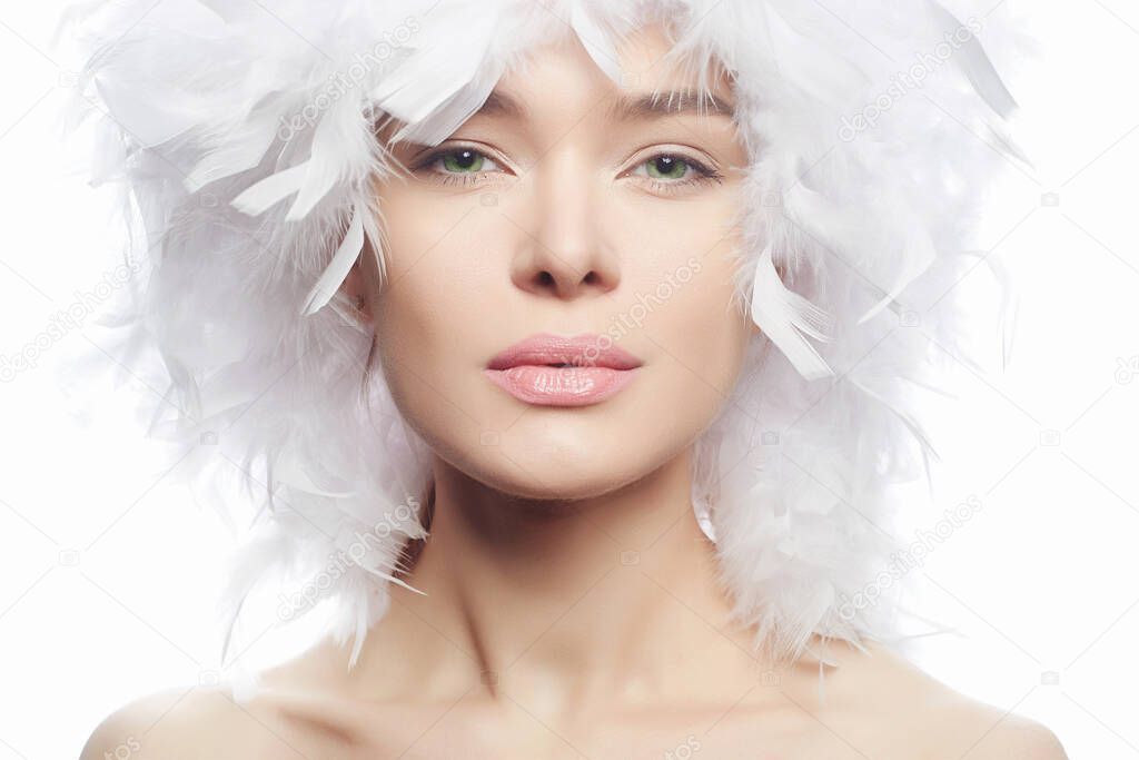 beauty portrait of young woman in white wig. beautiful girl like a bird