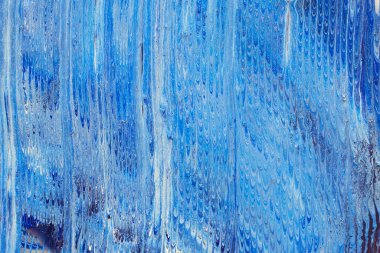 Mavi soyut boya arka planı. Sıvı pantolonlu deniz deseni