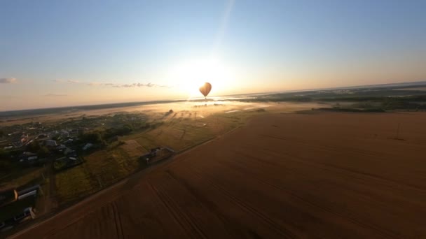 Black Orange Hot Air Balloon Floating Field Beautiful Summer Sunrise — Stockvideo