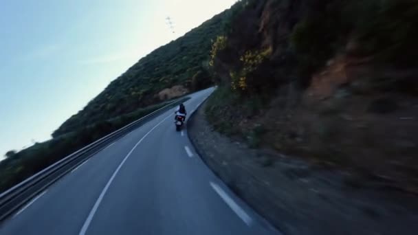 Fast Motorcycle Riding Serpentine Road Golden Hour Driver White Long — Video