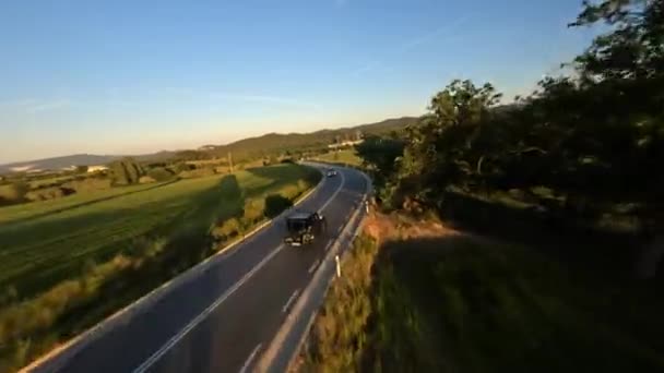 Cinematic Fpv Shot Gray Stylish Landrover Motorcycle Back Driving Green — Wideo stockowe