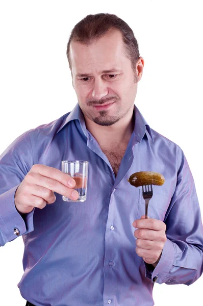 Image of a man with a glass of vodka Stock Image