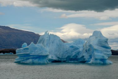 Iceberg in lake Argentino near Upsala glacier. clipart